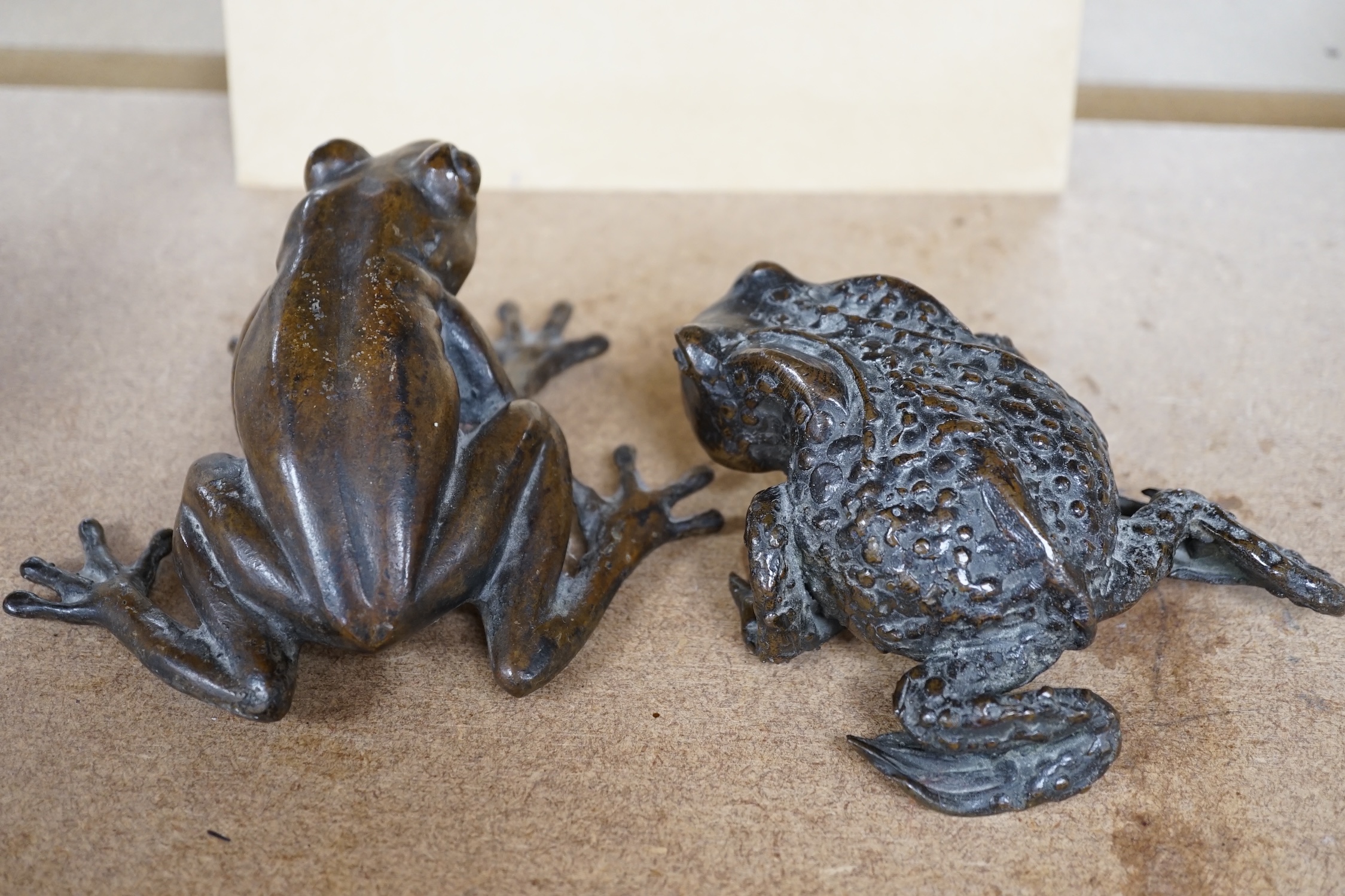 Pierre Chenet foundry (modern), a bronze model of a frog, together with an unsigned bronze model of a toad, largest 12cm. Condition - fair